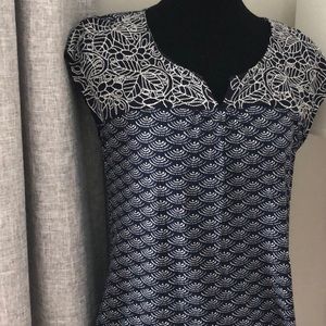 Shirt with lace at top, seashell design bottom